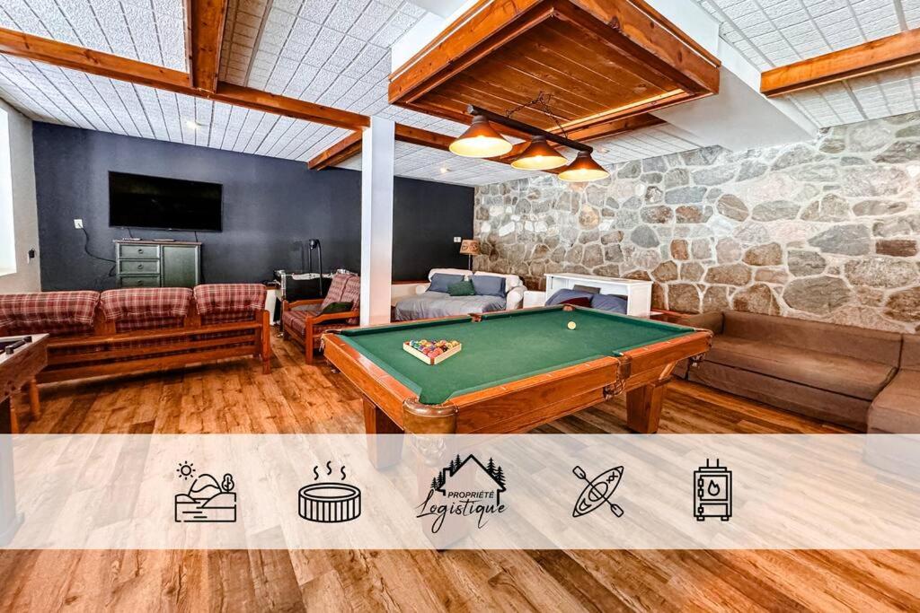 Maison du lac avec plage, embarcations, billard et spa privé