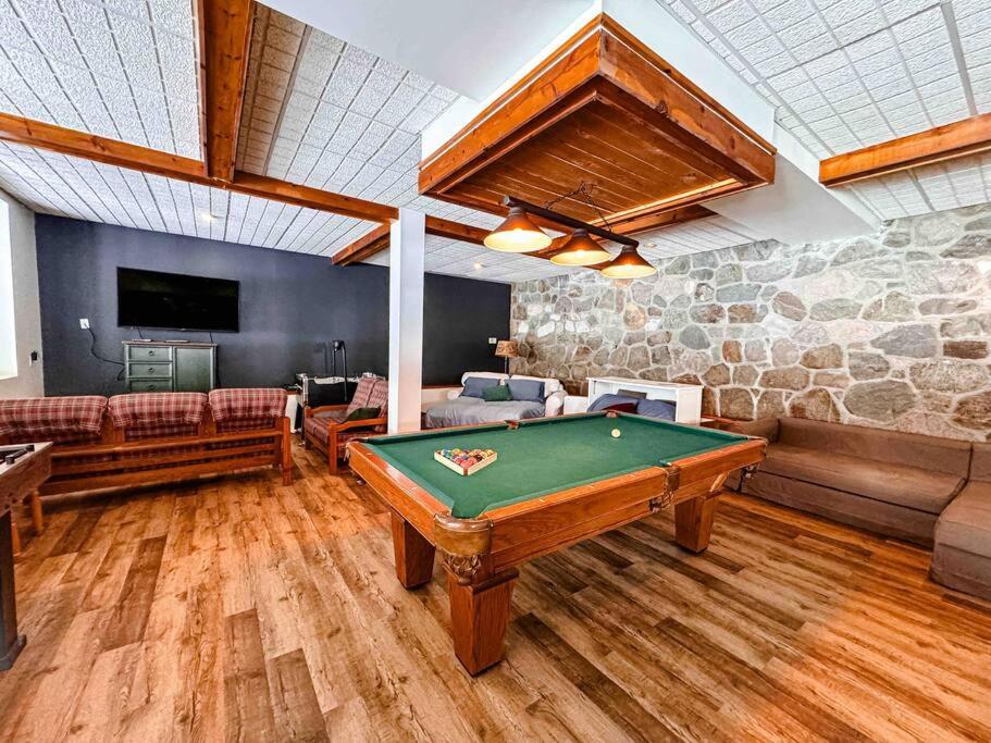 Maison du lac avec plage, embarcations, billard et spa privé
