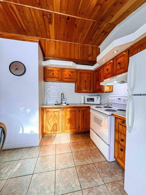 Maison du lac avec plage, embarcations, billard et spa privé