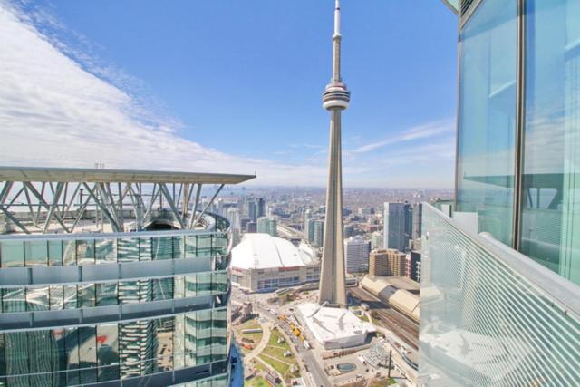 Presidential 2+1BR Condo, Entertainment District (Downtown) w/ CN Tower View, Balcony, Pool & Hot Tub
