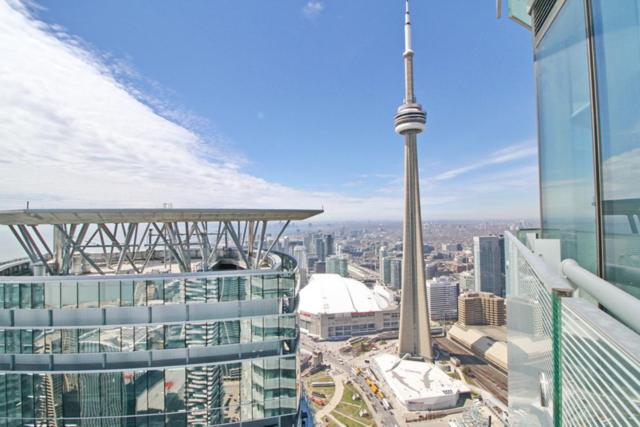Presidential 2+1BR Condo, Entertainment District (Downtown) w/ CN Tower View, Balcony, Pool & Hot Tub