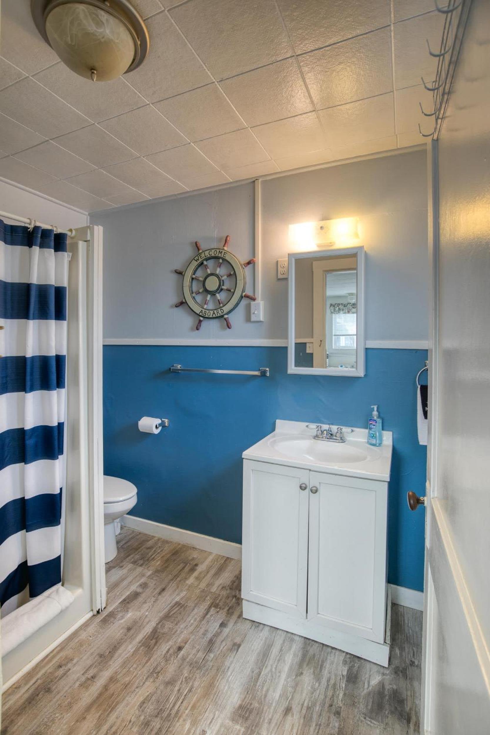 Anchor's Away Cottage Studio by the Sea w fireplace view 4