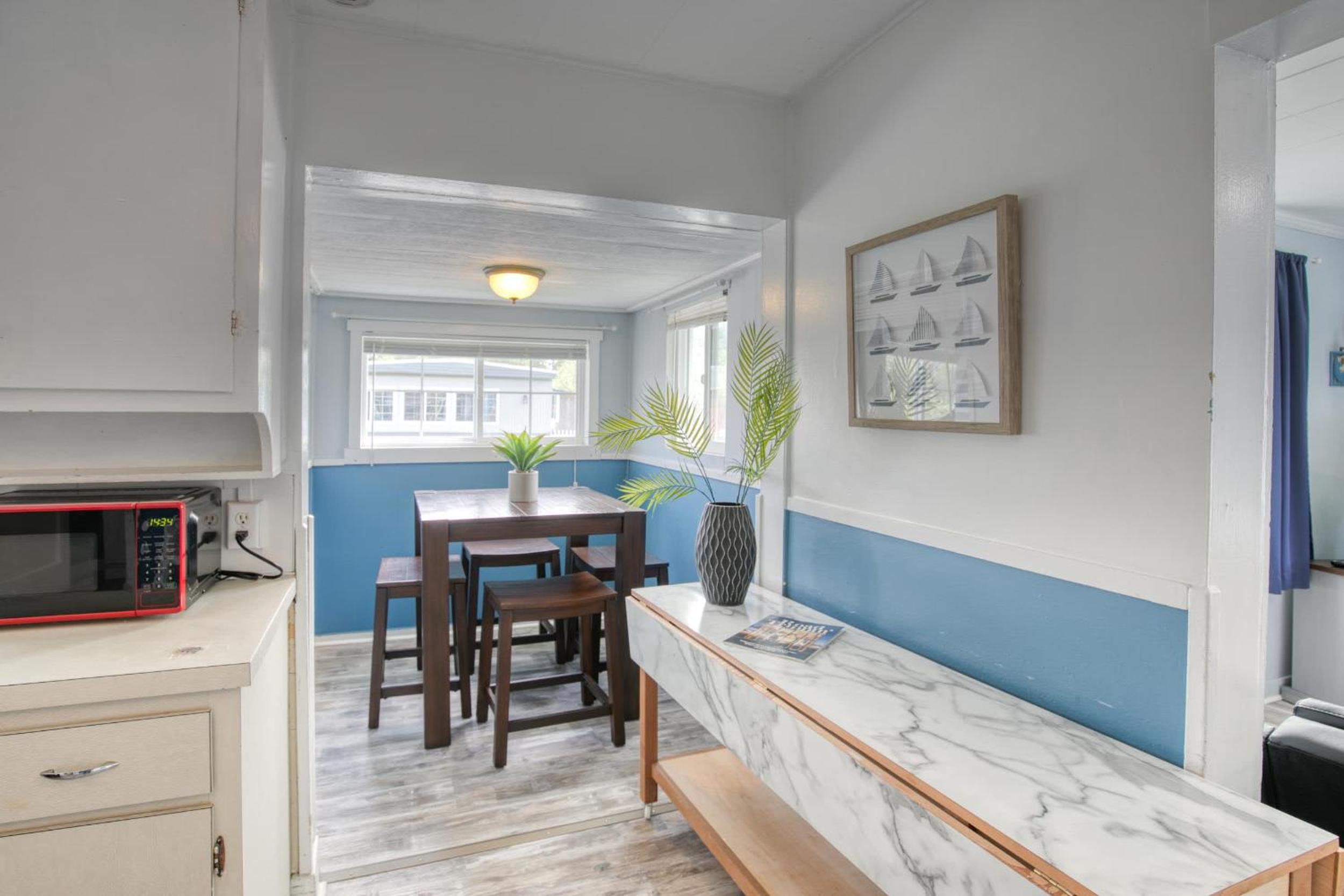 Anchor's Away Cottage Studio by the Sea w fireplace view 5