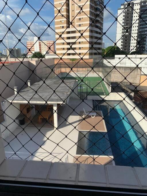 Ap no centro com piscina ao lado do supermercado.