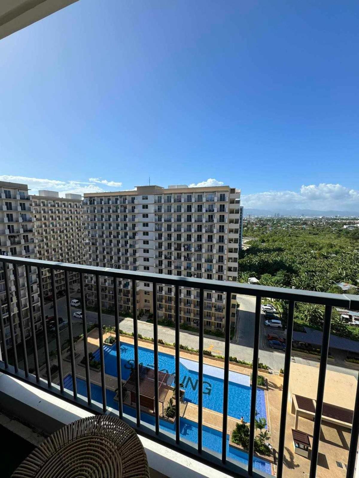 Bea's Staycation Condo Rental - Pool view 304-14Flr view 2
