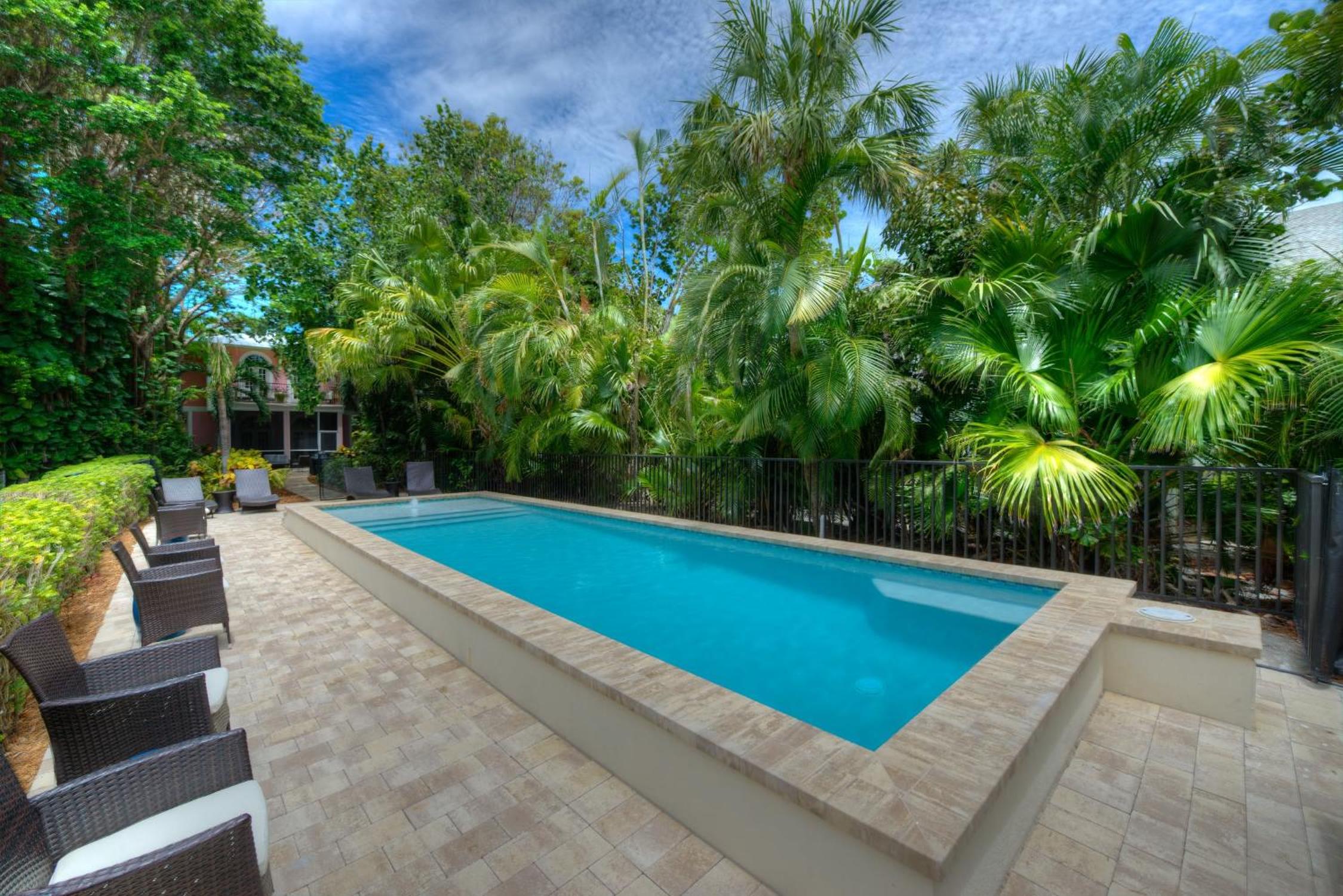Waterfront Pink House with Private Dock & Pool view 3
