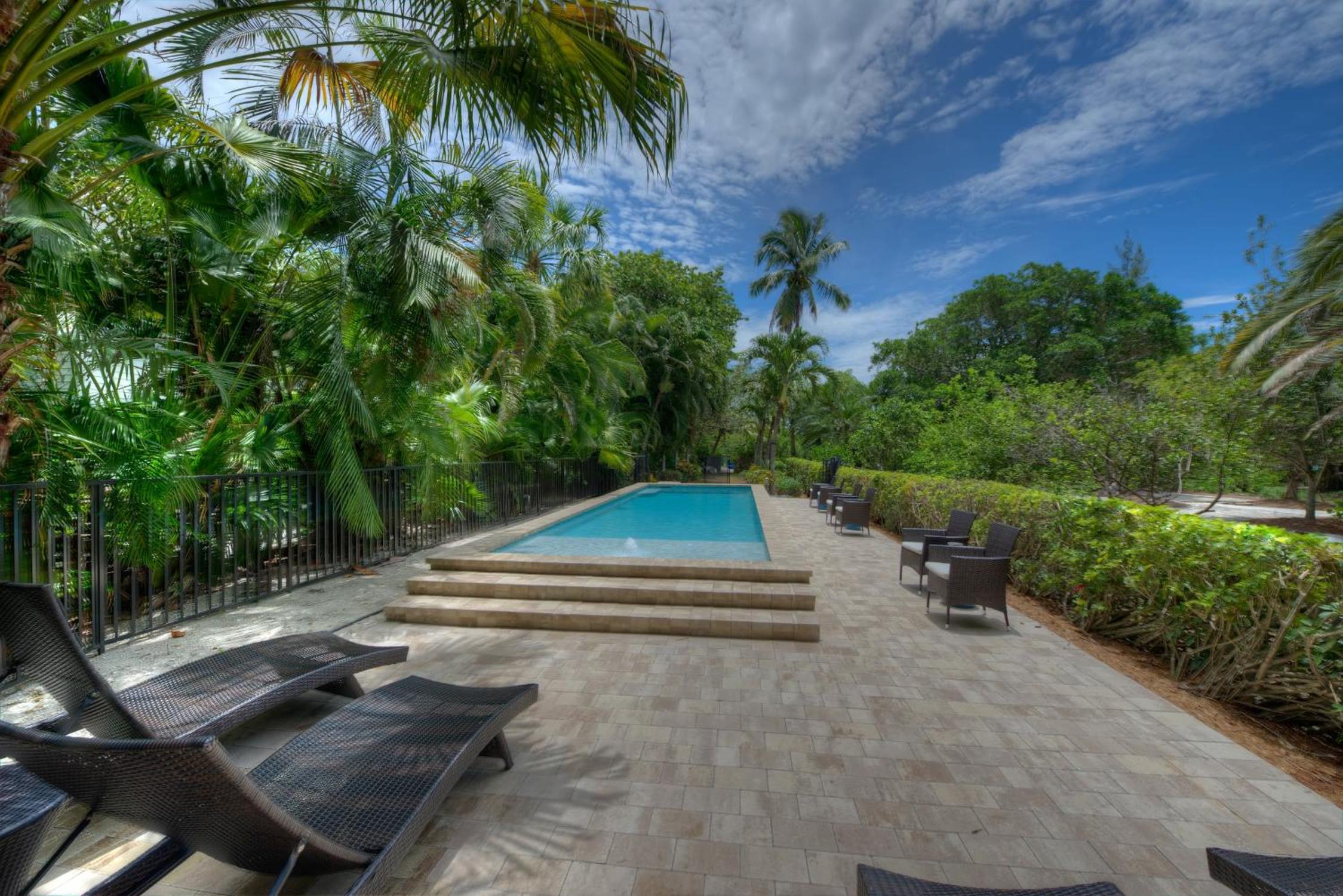 Waterfront Pink House with Private Dock & Pool view 4