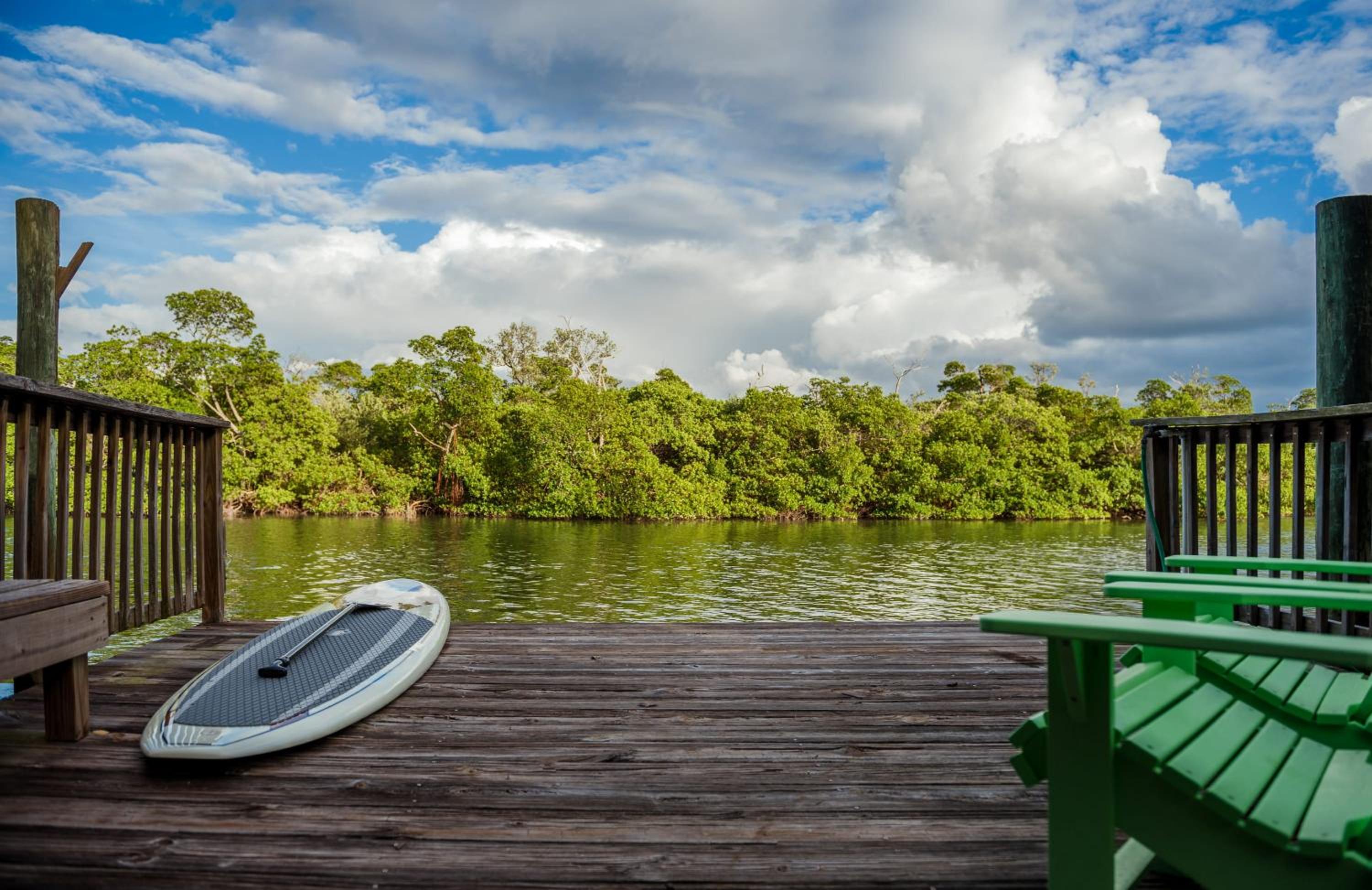 Waterfront Pink House with Private Dock & Pool view 5