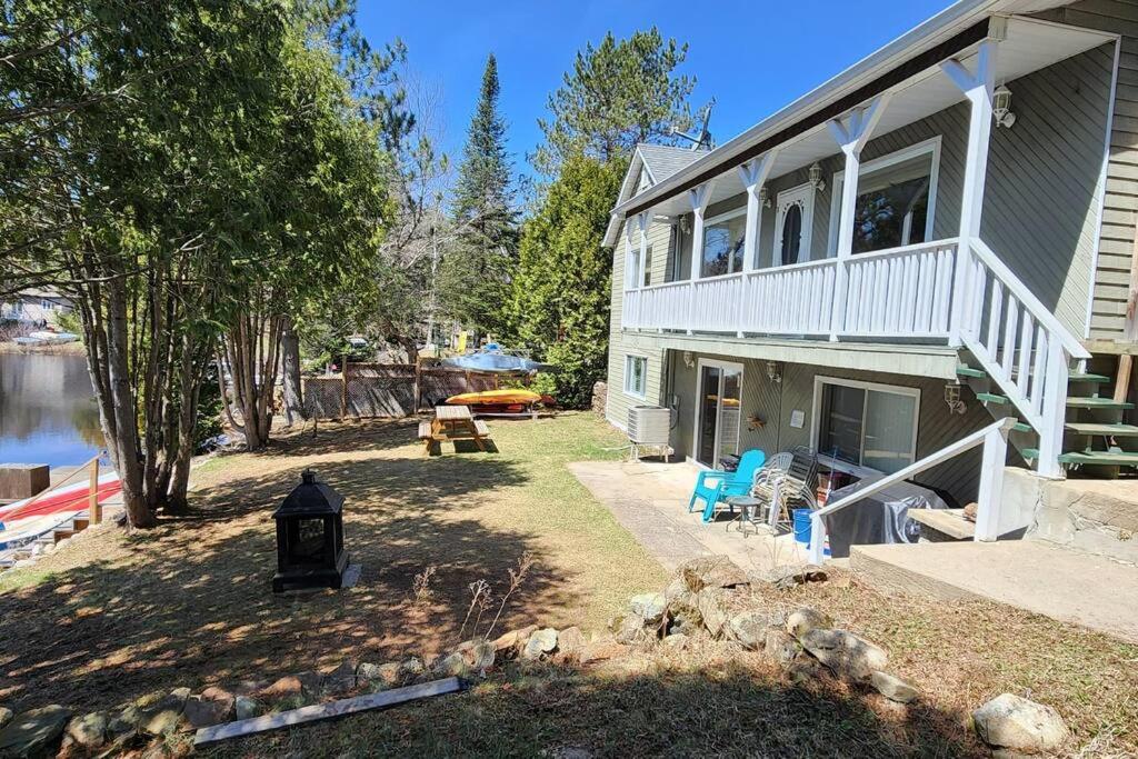 Peaceful Waterfront Getaway - Swim Fish Paddle boat Golf Hike Ski Shop