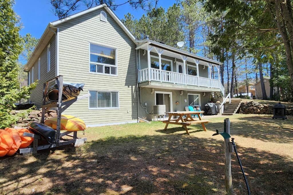 Peaceful Waterfront Getaway - Swim Fish Paddle boat Golf Hike Ski Shop
