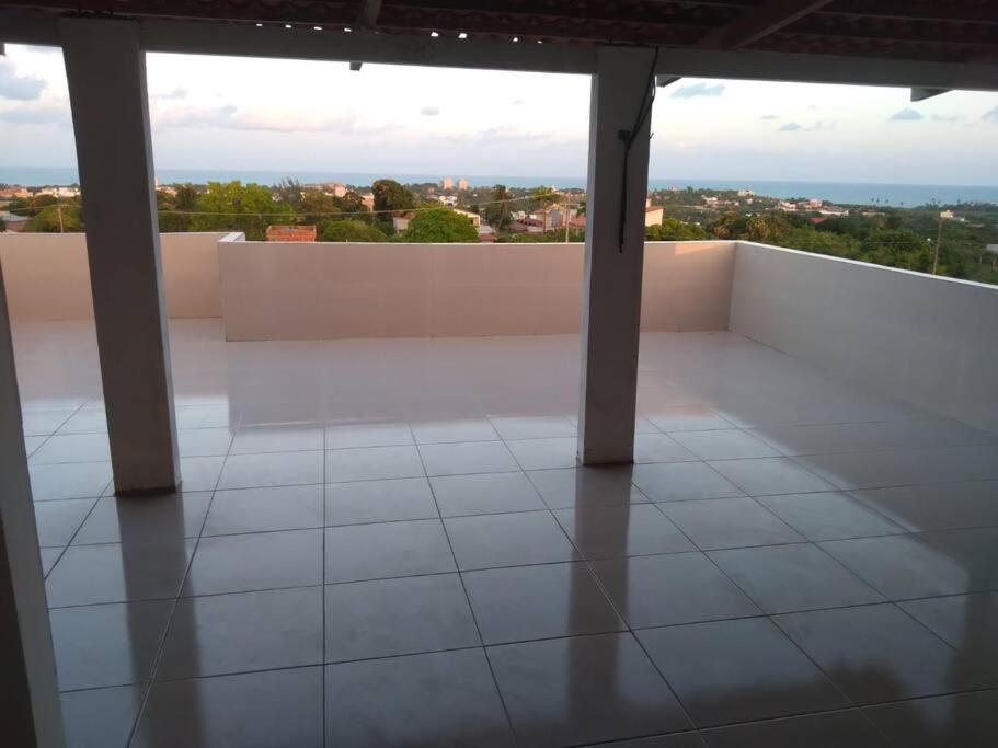 Casa duplex com terraço e vista pro mar