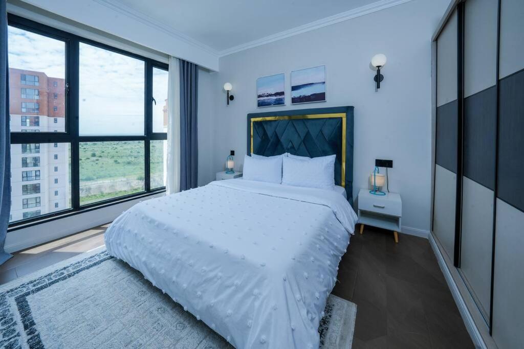 Abantu Parkview 2BR Suite near JKIA SGR with Pool Gym Eatery