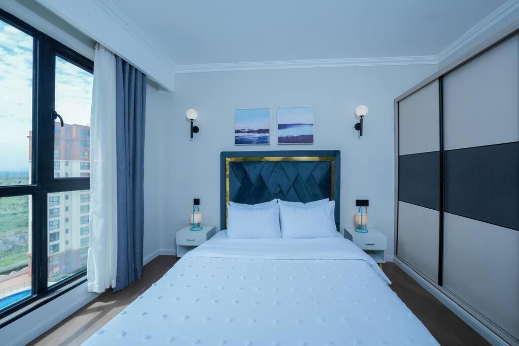 Abantu Parkview 2BR Suite near JKIA SGR with Pool Gym Eatery