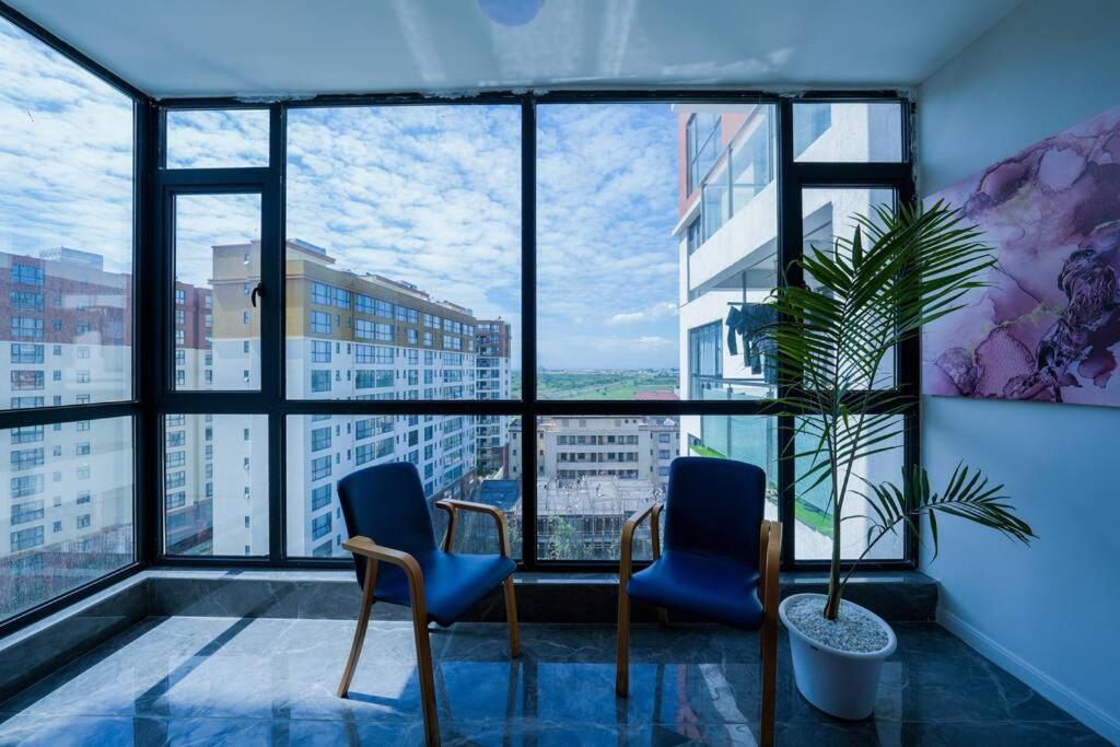 Abantu Parkview 2BR Suite near JKIA SGR with Pool Gym Eatery