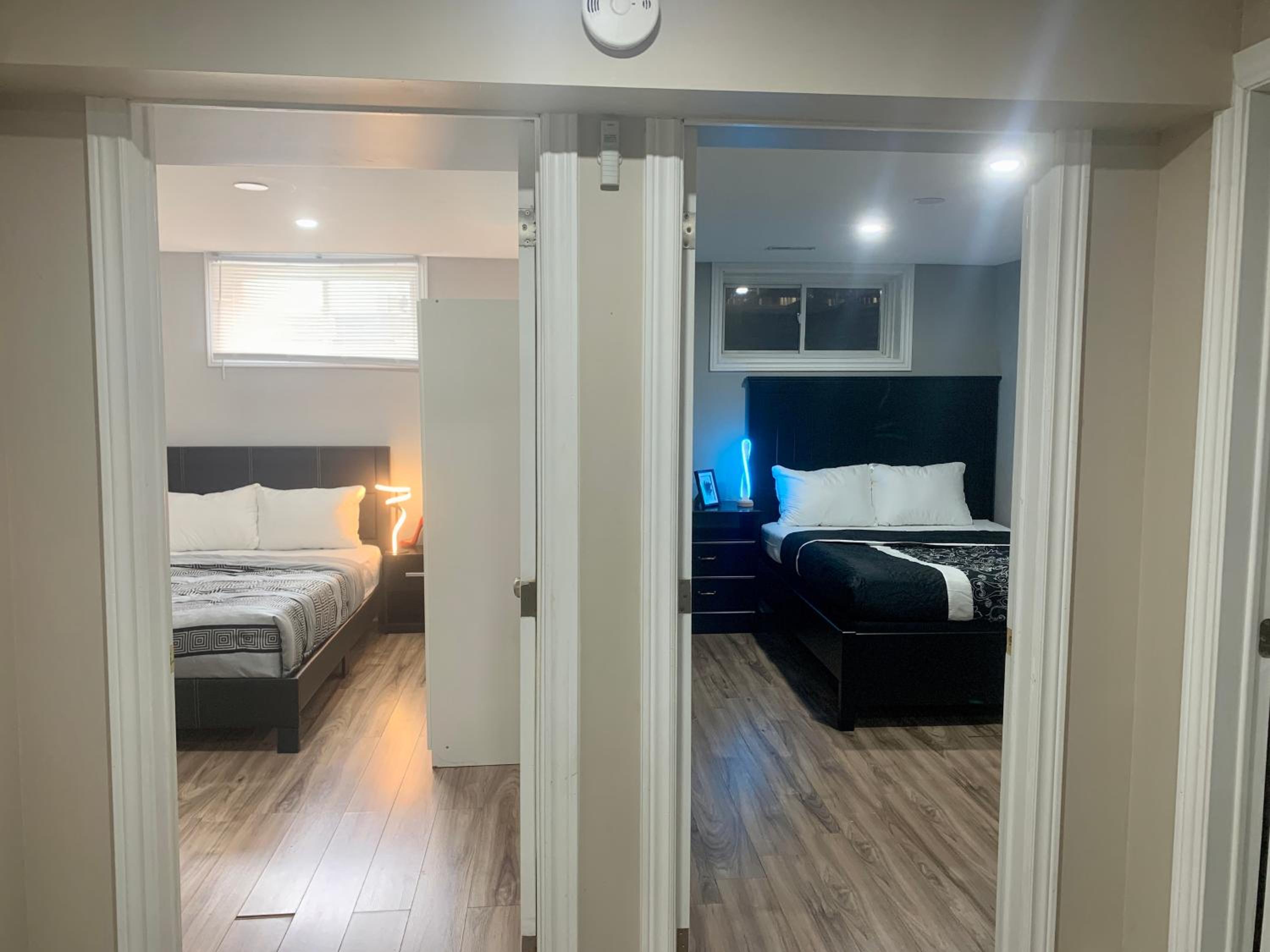Guelph Vacations - A bedroom in a basement - Property Image 18