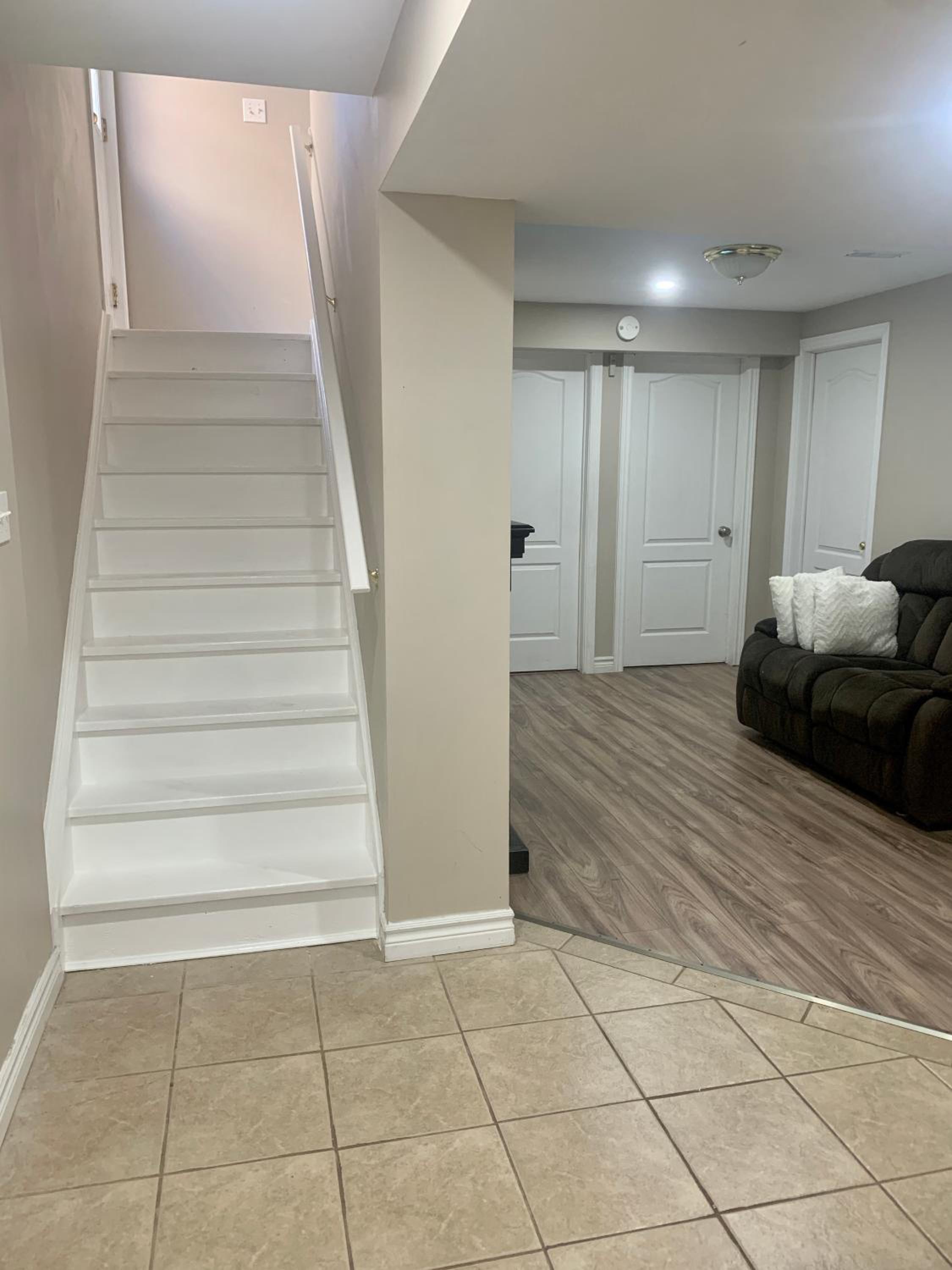 Guelph Vacations - A bedroom in a basement - Property Image 19