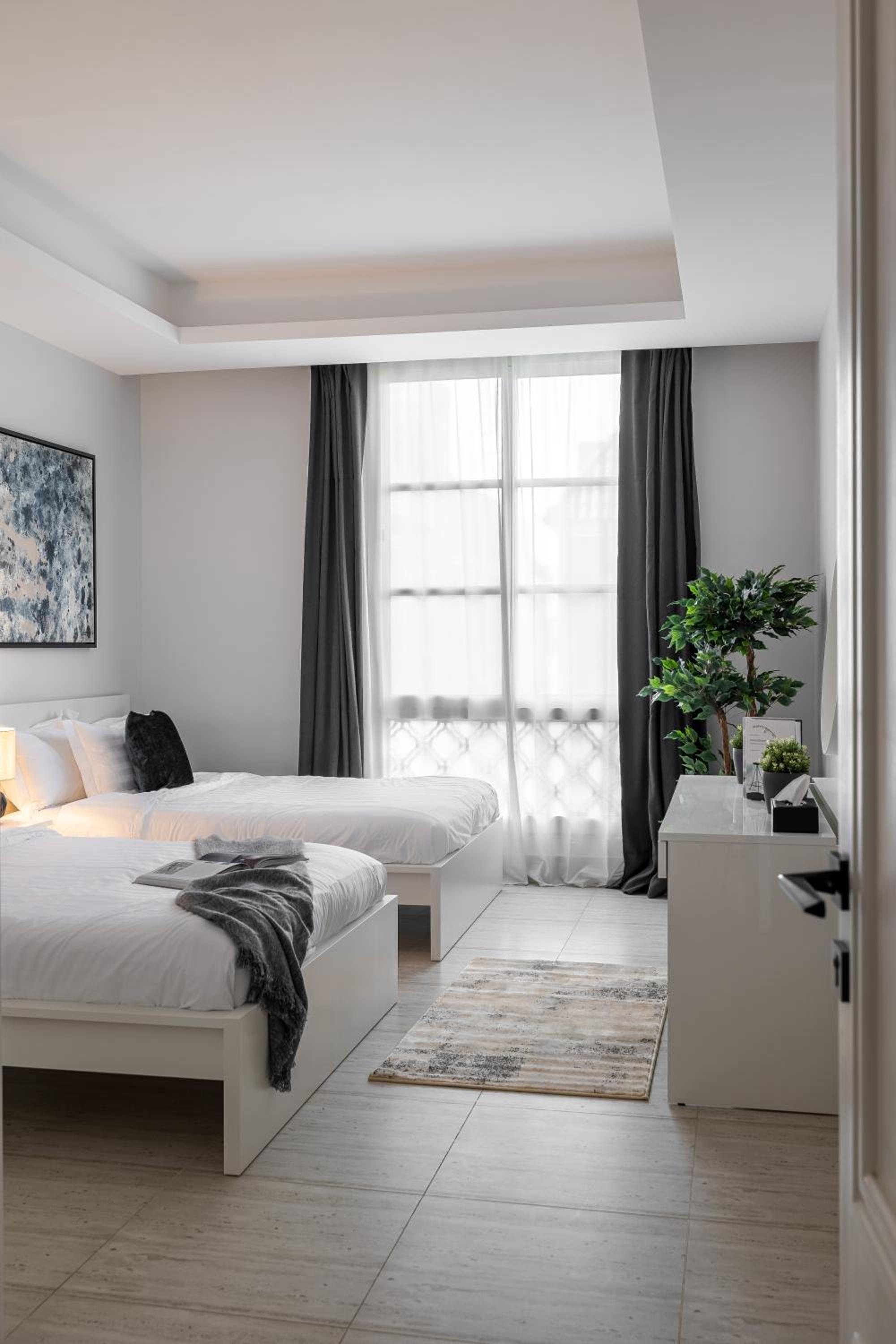 Modern 3BR Retreat I Gym, Balcony & Prime Location