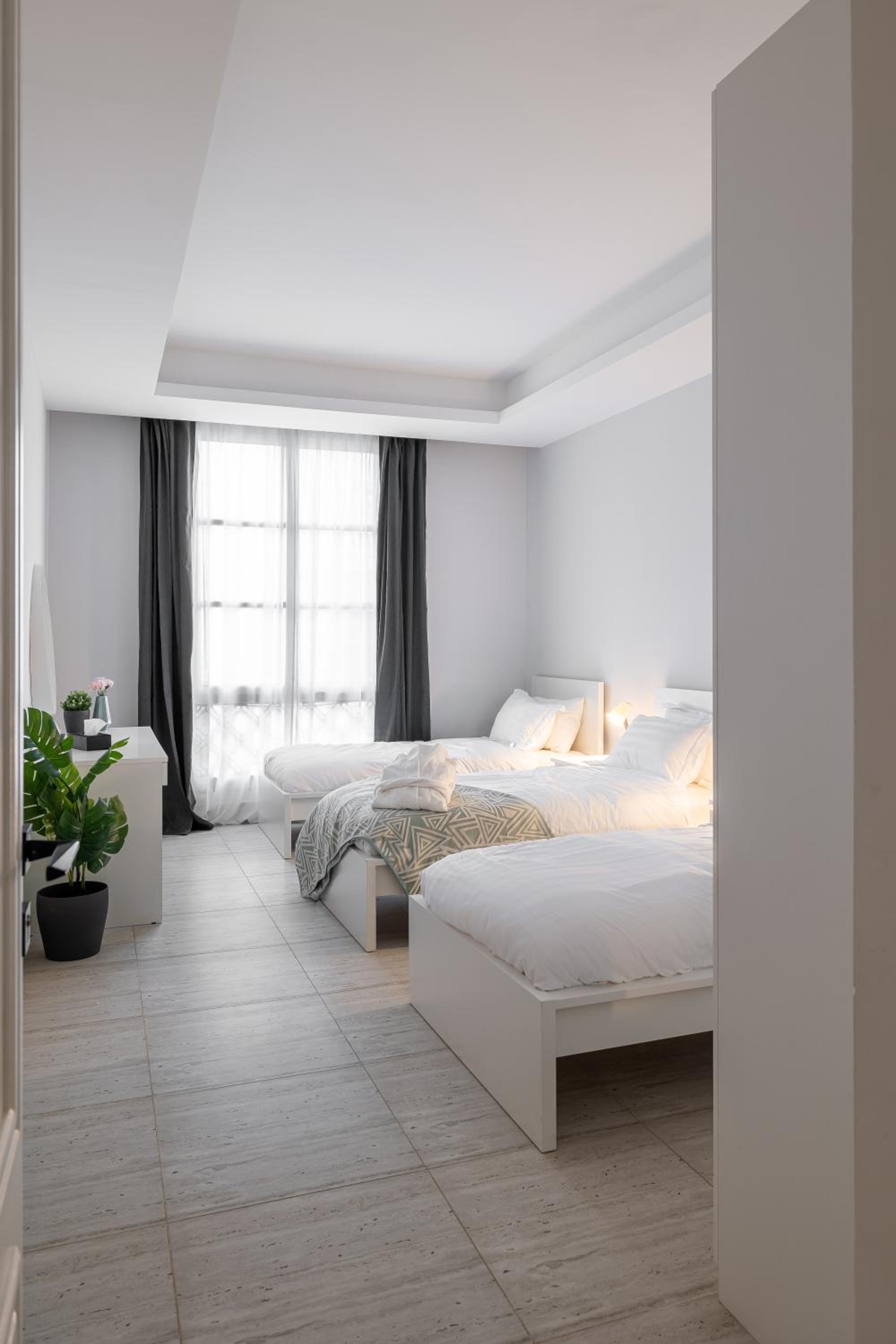 Modern 3BR Retreat I Gym, Balcony & Prime Location