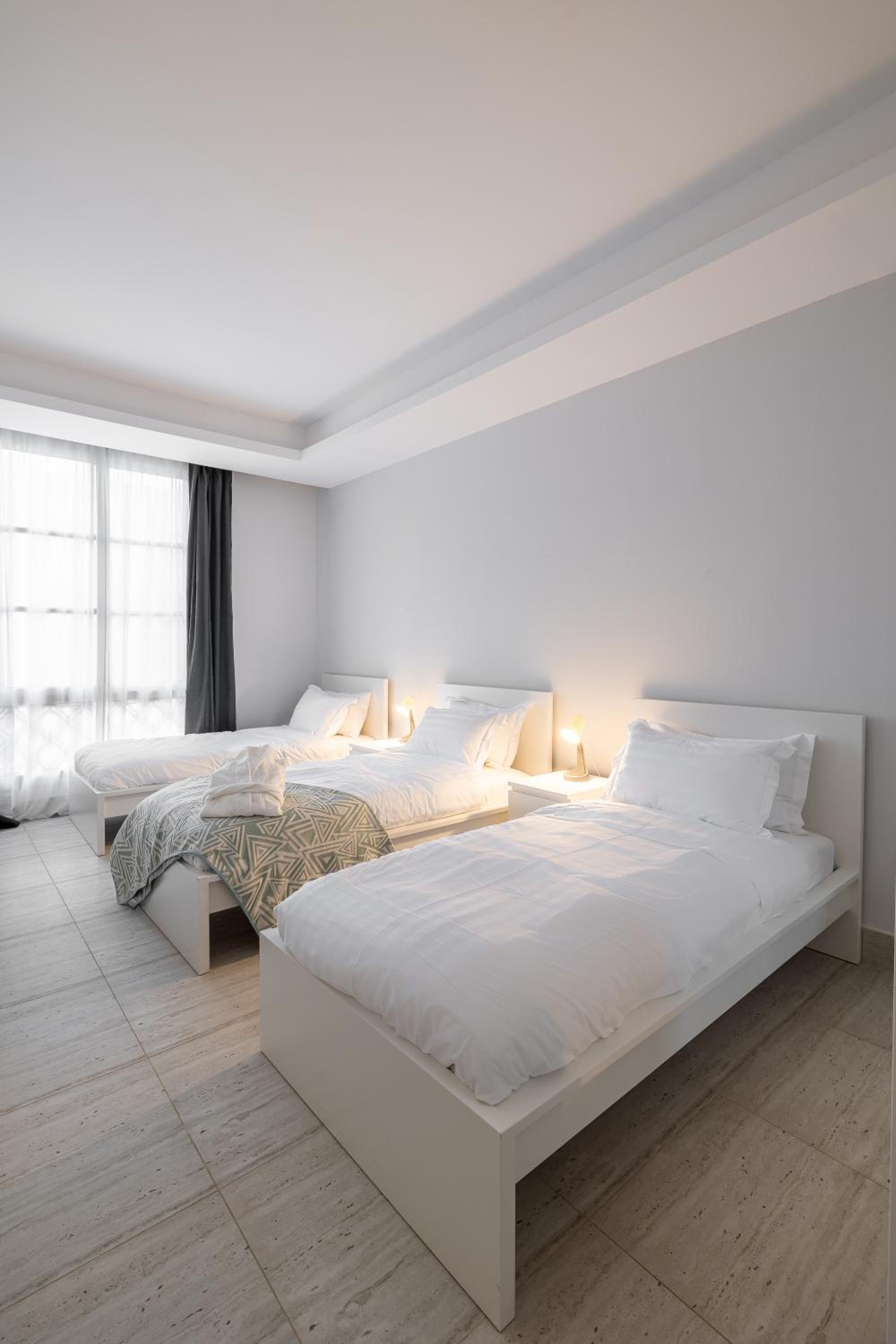 Modern 3BR Retreat I Gym, Balcony & Prime Location
