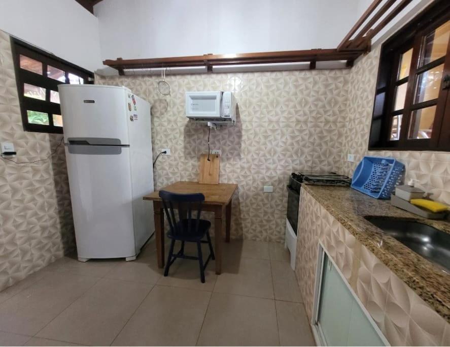 Casa de condomínio 900m da Praia de Boiçucanga
