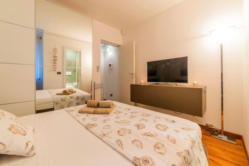 Trilocale sulla Spiaggia - Parcheggio Privato