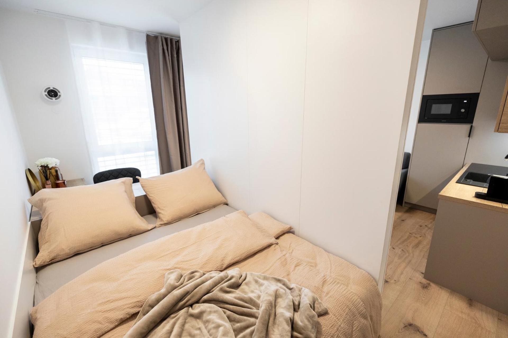 ALURE RESIDENCES 5 & 24h self check-in, private parking in front of the apartment building included, new building, the apartment building has its own park  view 3