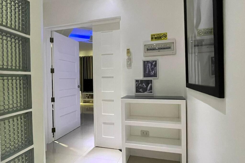 Sheryll Updates - Kandi T2 breezy 1BR on 9th floor with Housekeeping & Netflix view 5