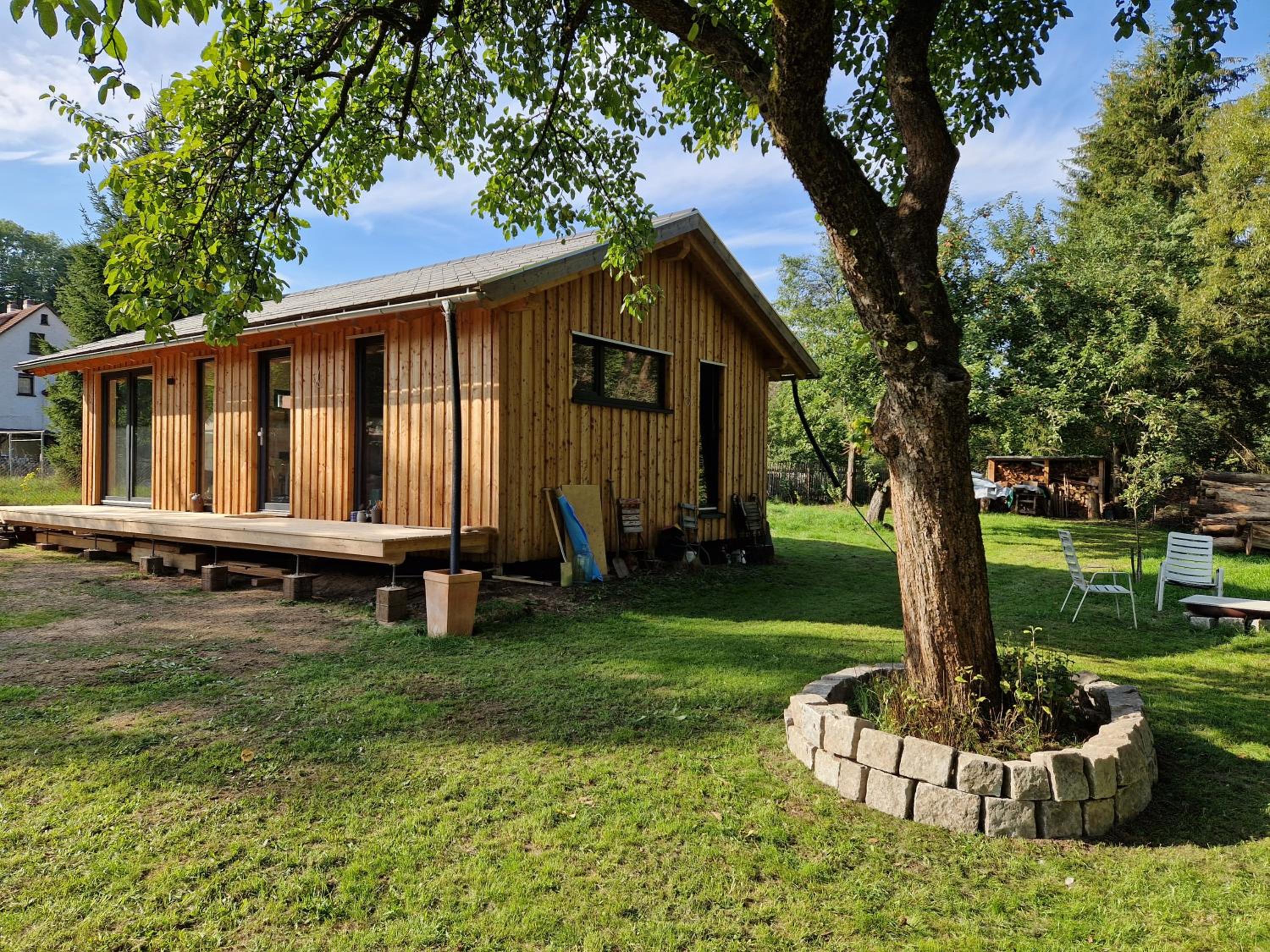 Holzhaus mit Kamin - Am Forellenfluss