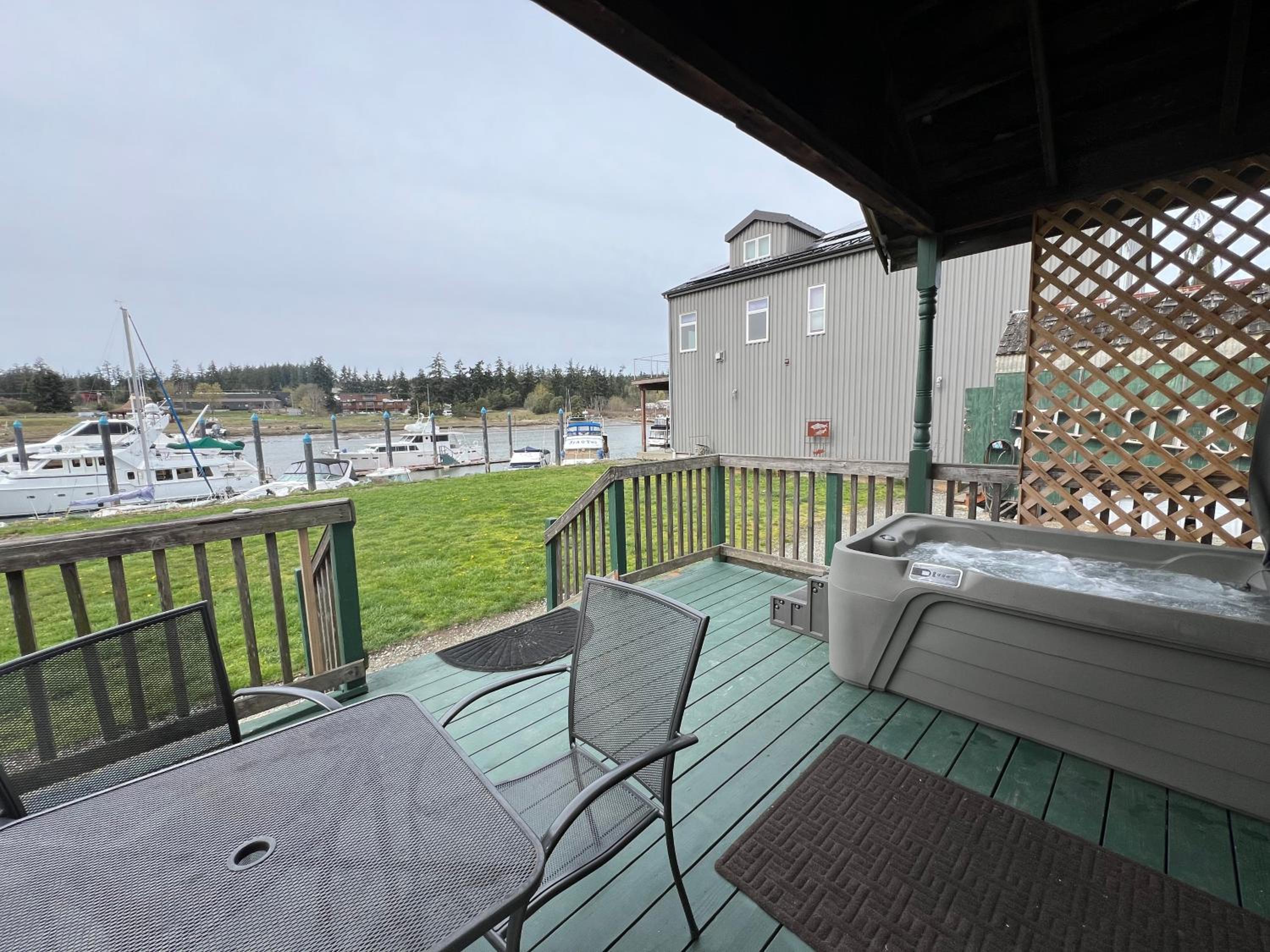 Bridge Tender Shack with hot tub on deck view 5