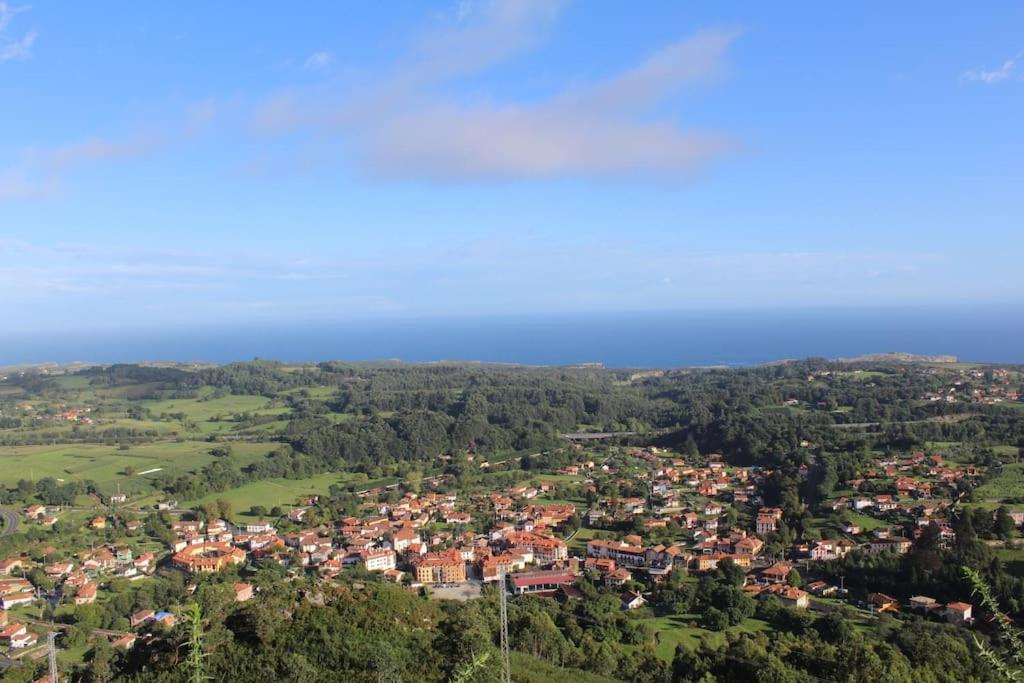 Acogedor bajo con terraza y vistas