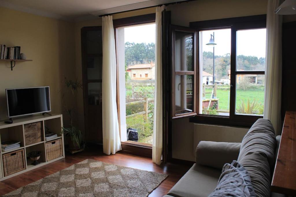 Acogedor bajo con terraza y vistas