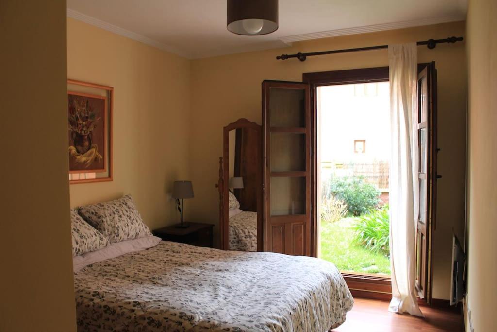 Acogedor bajo con terraza y vistas