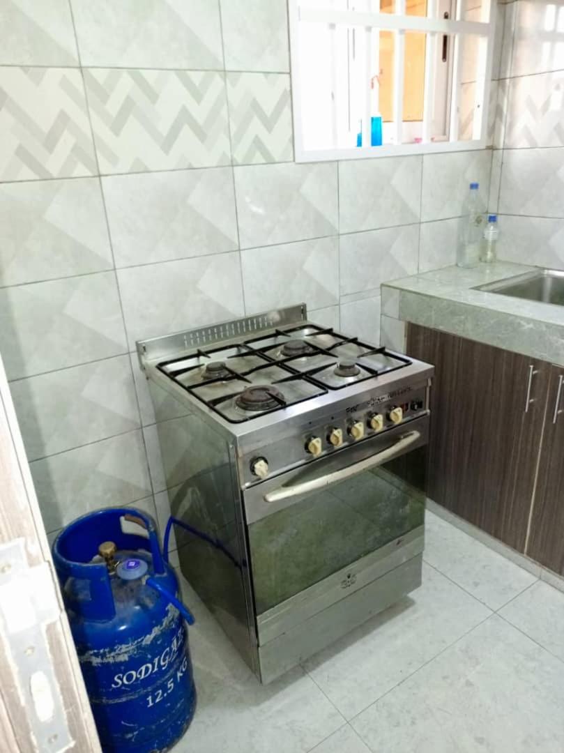 Appartement chambre salon Kégué Stade view 2