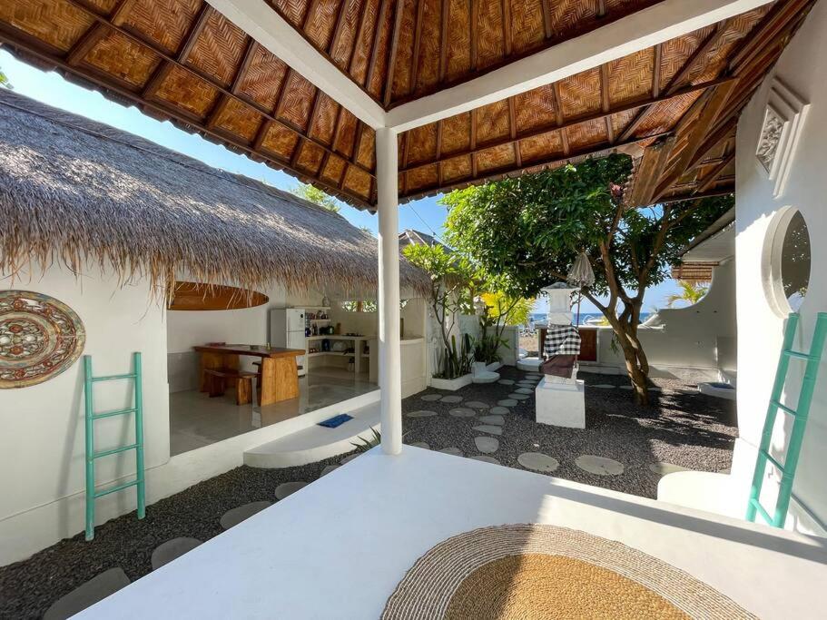 The Hidden Escapes Amed- 2BR Beachfront Villa with Direct Beach Access view 2