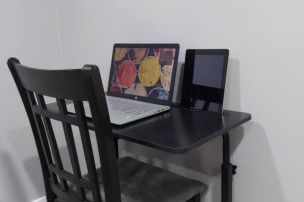 Cozy 2-Bedroom Basement Guest Suite with Private Entrance and Proximity to the Airport