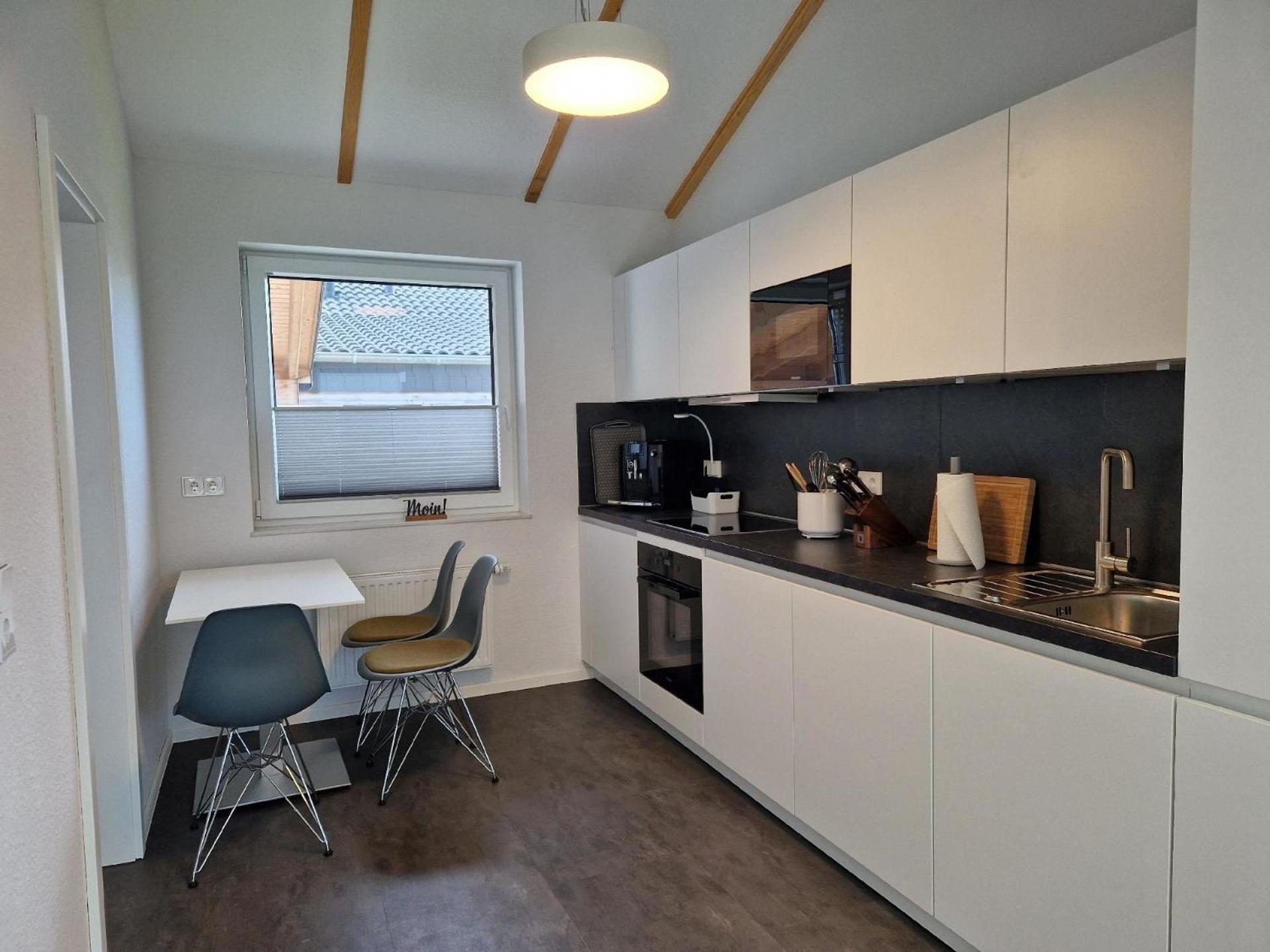 Ferienhaus mit Wintergarten und Waschmaschine