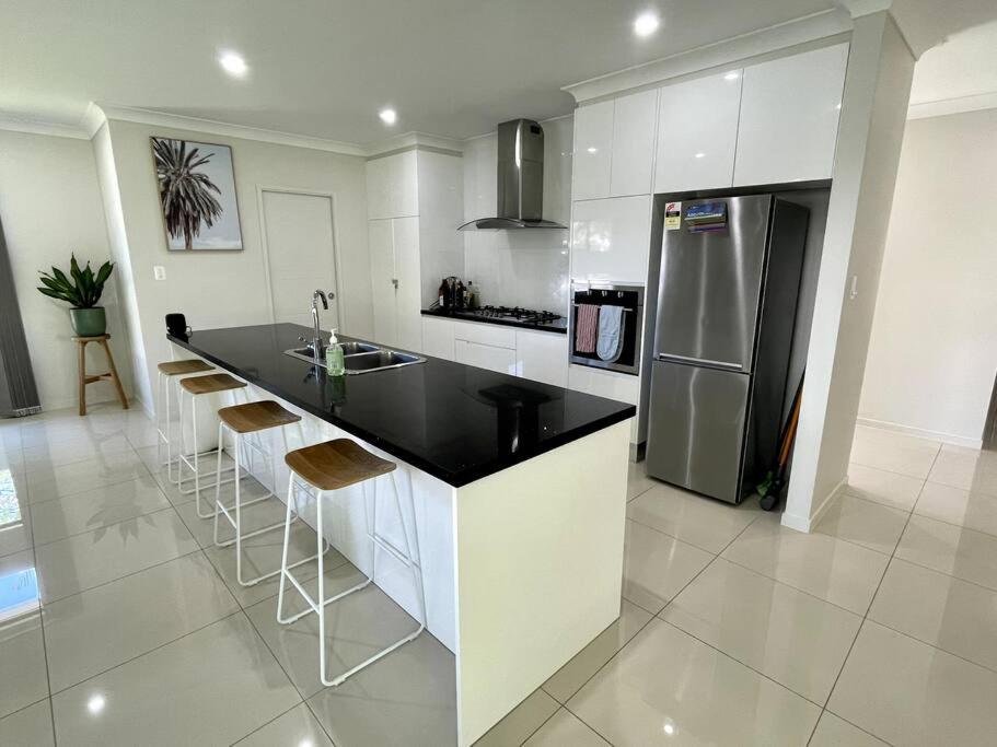 New Pool Now Open! - Trinity Beach Haven - Luxury 4 bedroom home, Steps to the Beach, Surrounded by Mountains