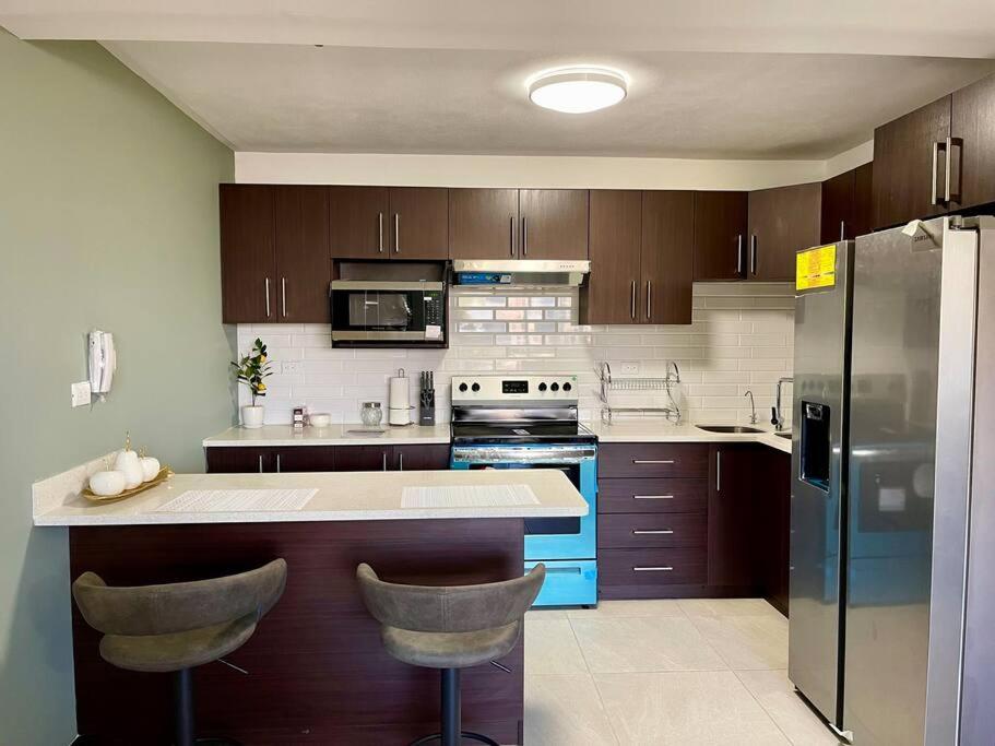 Lovely 3-bedroom rental unit with free parking view 3