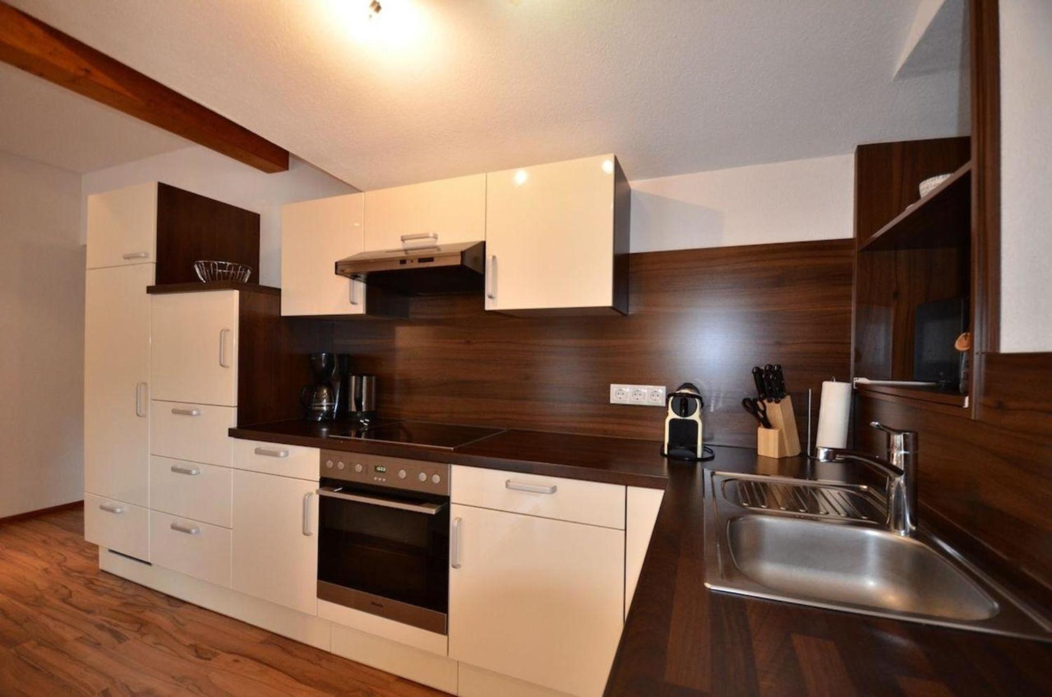 Appartement vor toller Gebirgskulisse mit Kamin