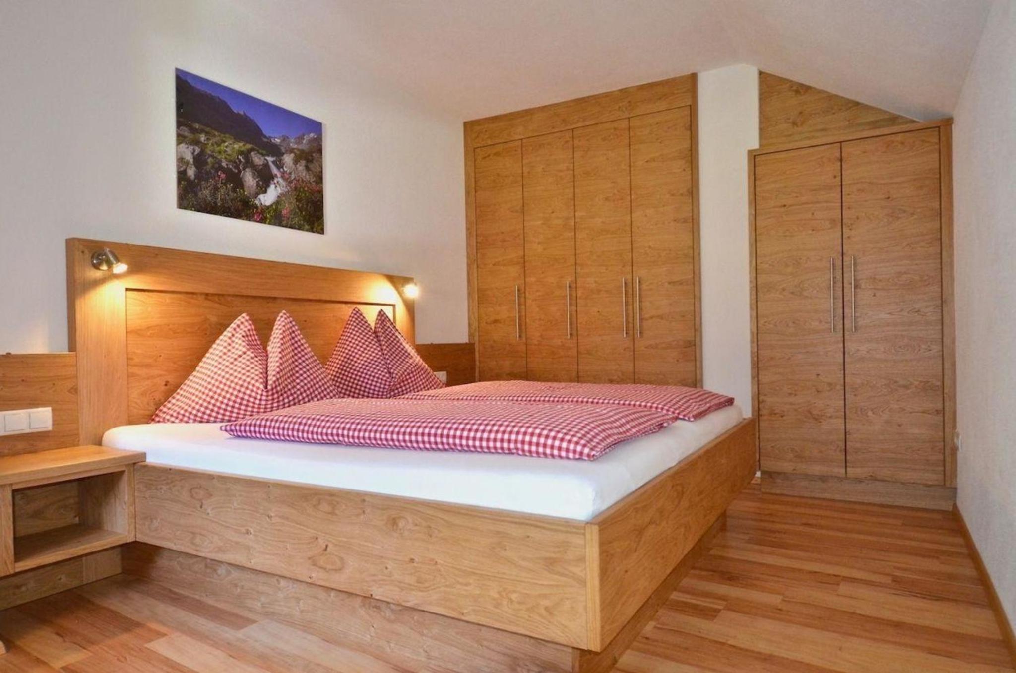Appartement vor toller Gebirgskulisse mit Kamin