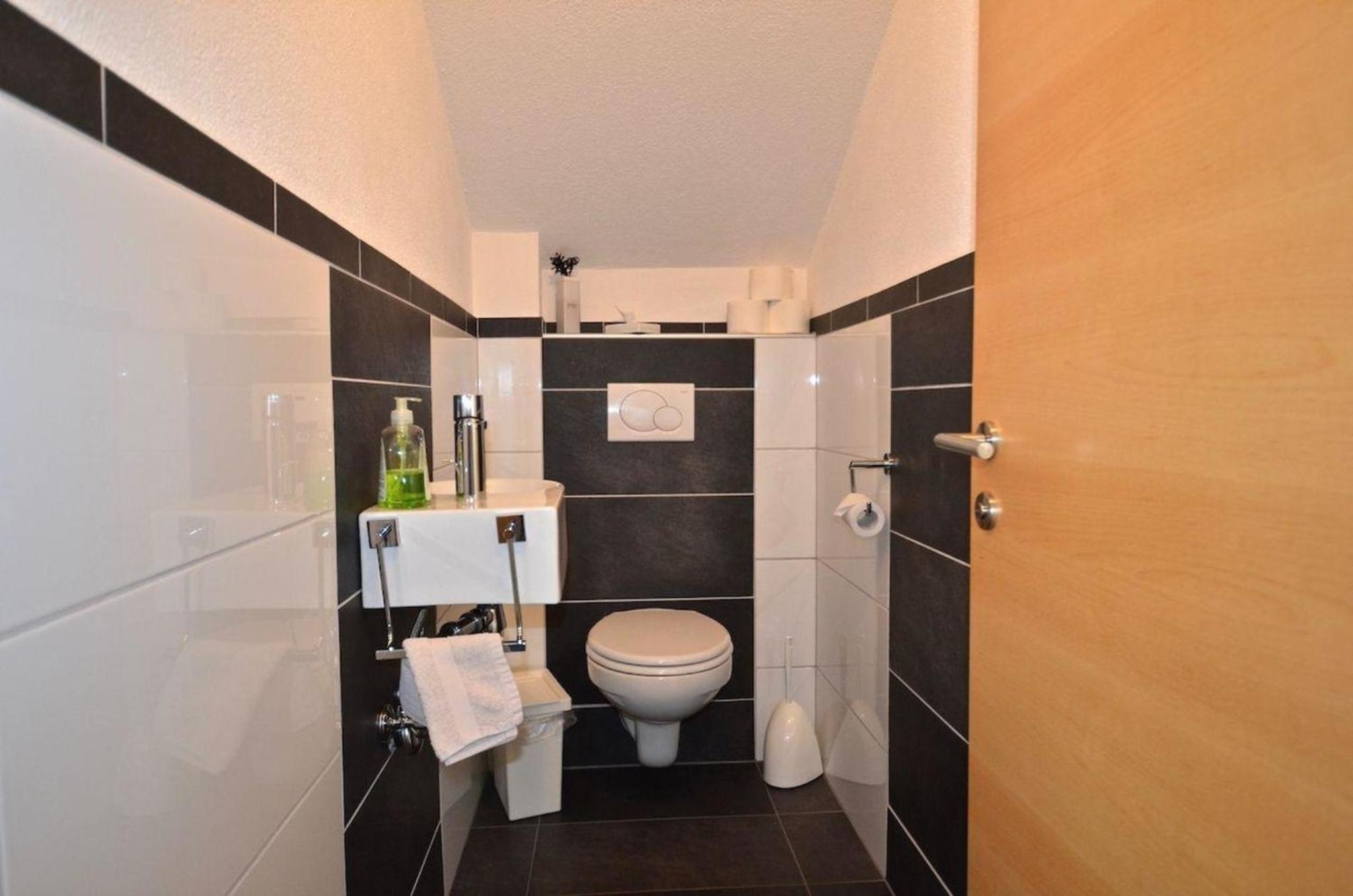 Appartement vor toller Gebirgskulisse mit Kamin