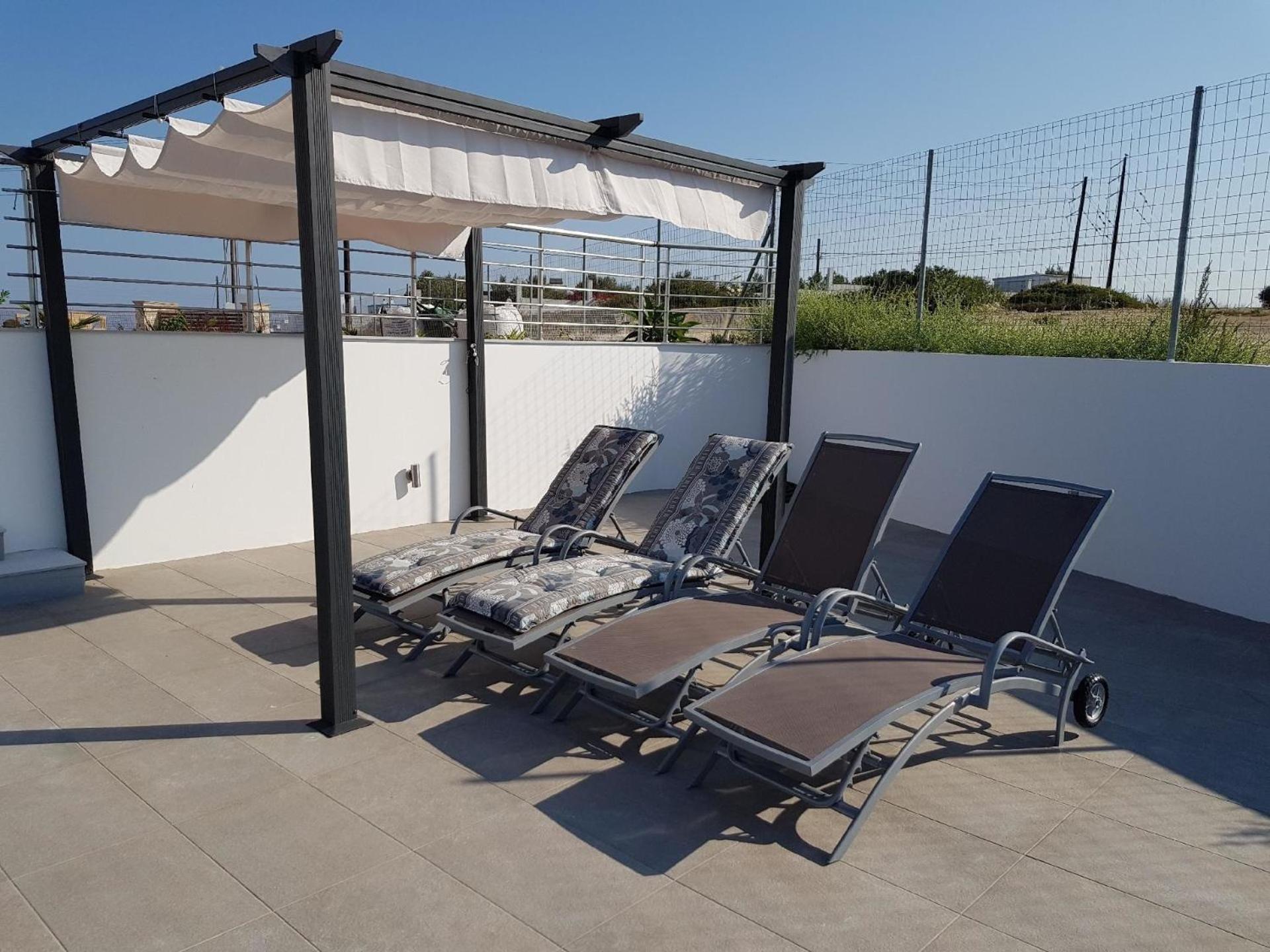 Modernes Ferienhaus mit Sonnenterrasse, Pool, Grill und einem herrlichen Meerblick
