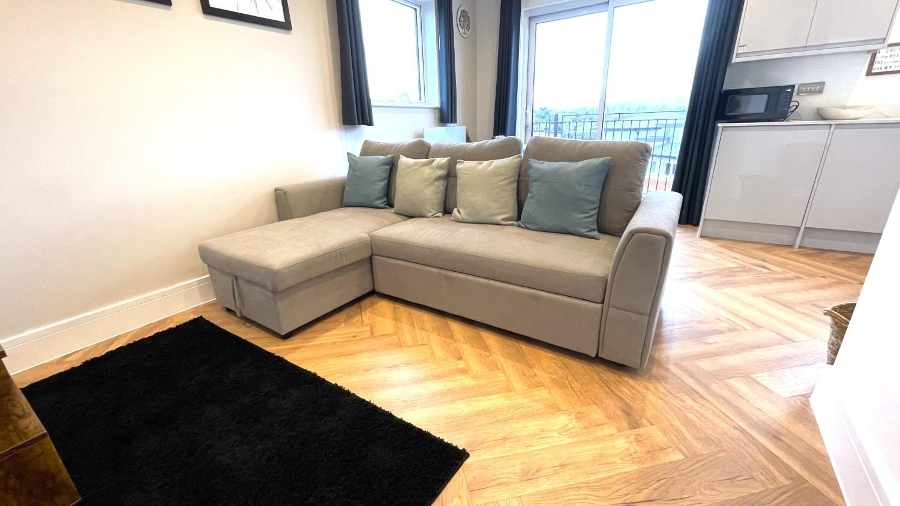 Refined Living, Wi-Fi, Balcony and Parking view 4