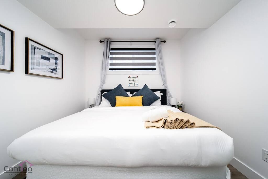 The Zen Den, King Bed, Near DT, WEM, Heated Floor, Bsmt Suite