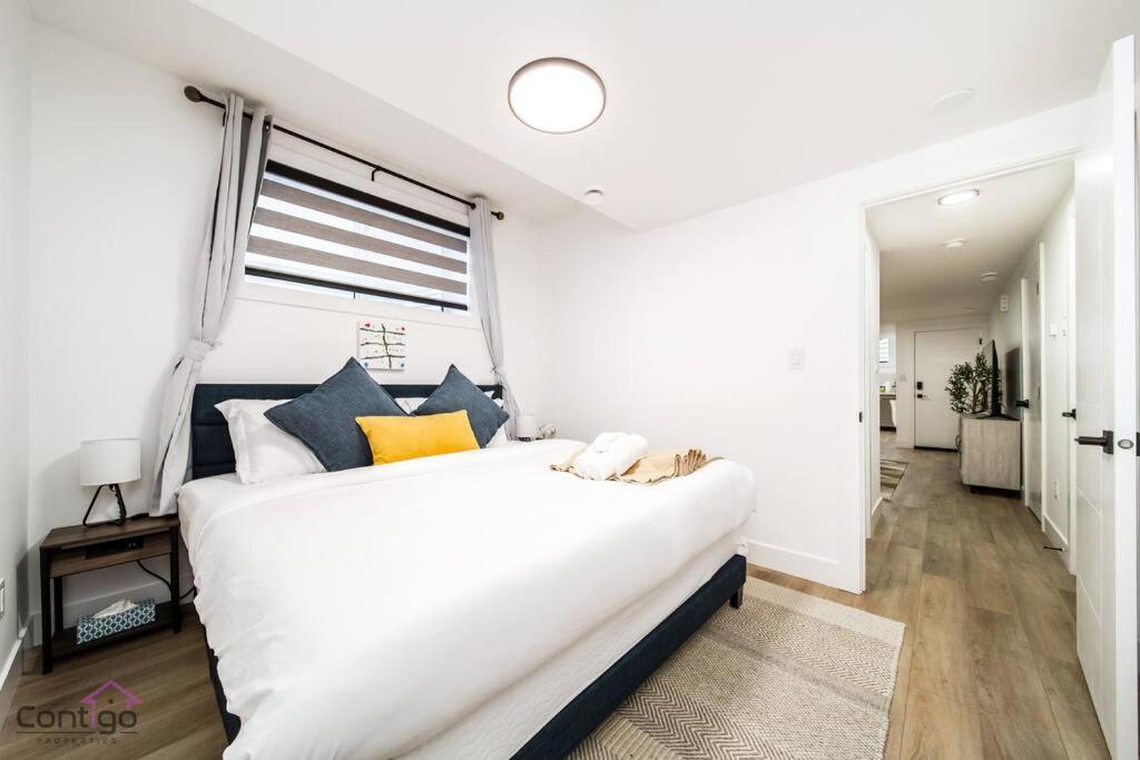 The Zen Den, King Bed, Near DT, WEM, Heated Floor, Bsmt Suite