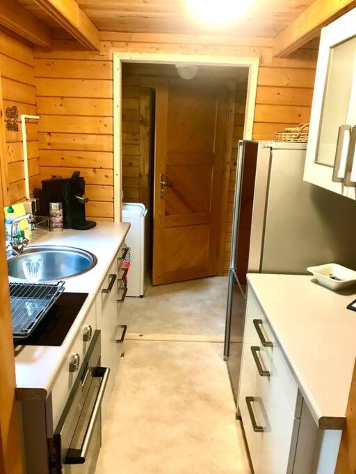 FEWO PARTNERS Haus Clemens - Gemütliches Holzhaus mit Grundstück nahe Badesee