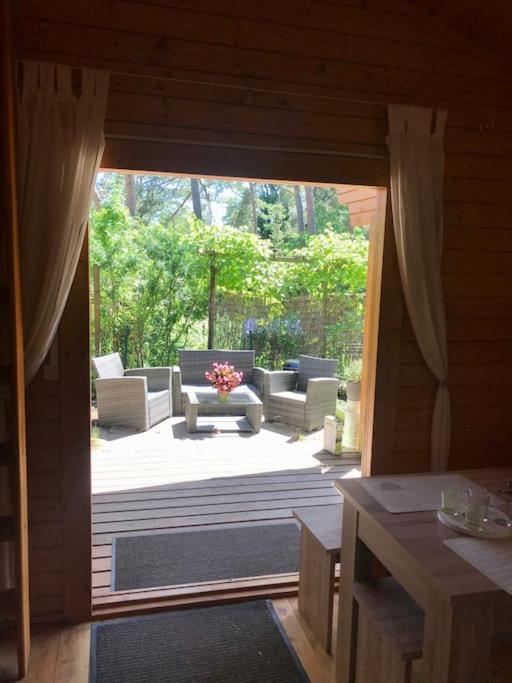 FEWO PARTNERS Haus Clemens - Gemütliches Holzhaus mit Grundstück nahe Badesee