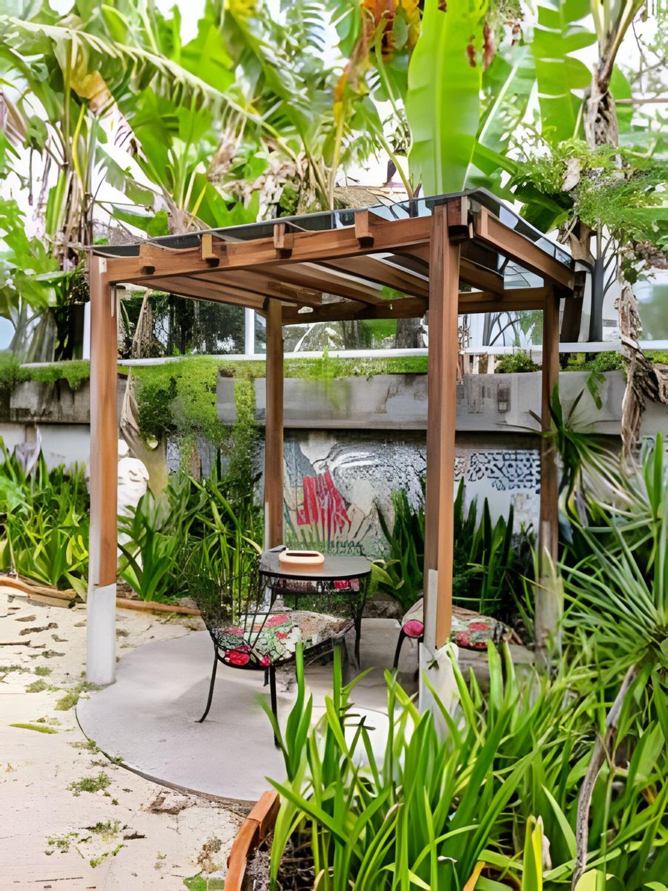 Estúdios 350m da praia e centro de Canasvieiras - Auto check-in - Jardins e e gazebos para relaxar - RESIDENCIAL AVÓ ISAURA