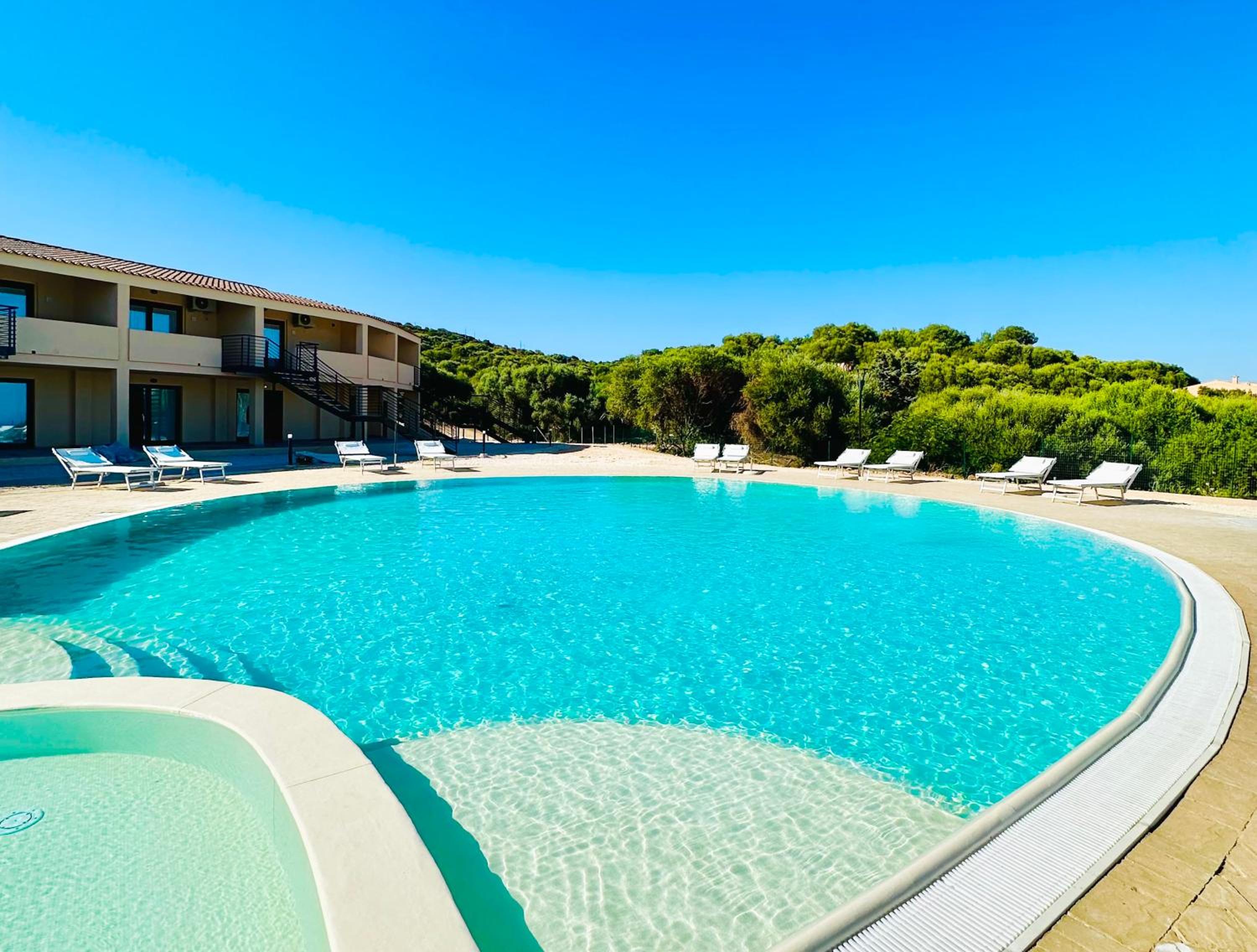 Residence with swimming-pool in Isola Rossa, just about 2 km from the beach La Marinedda