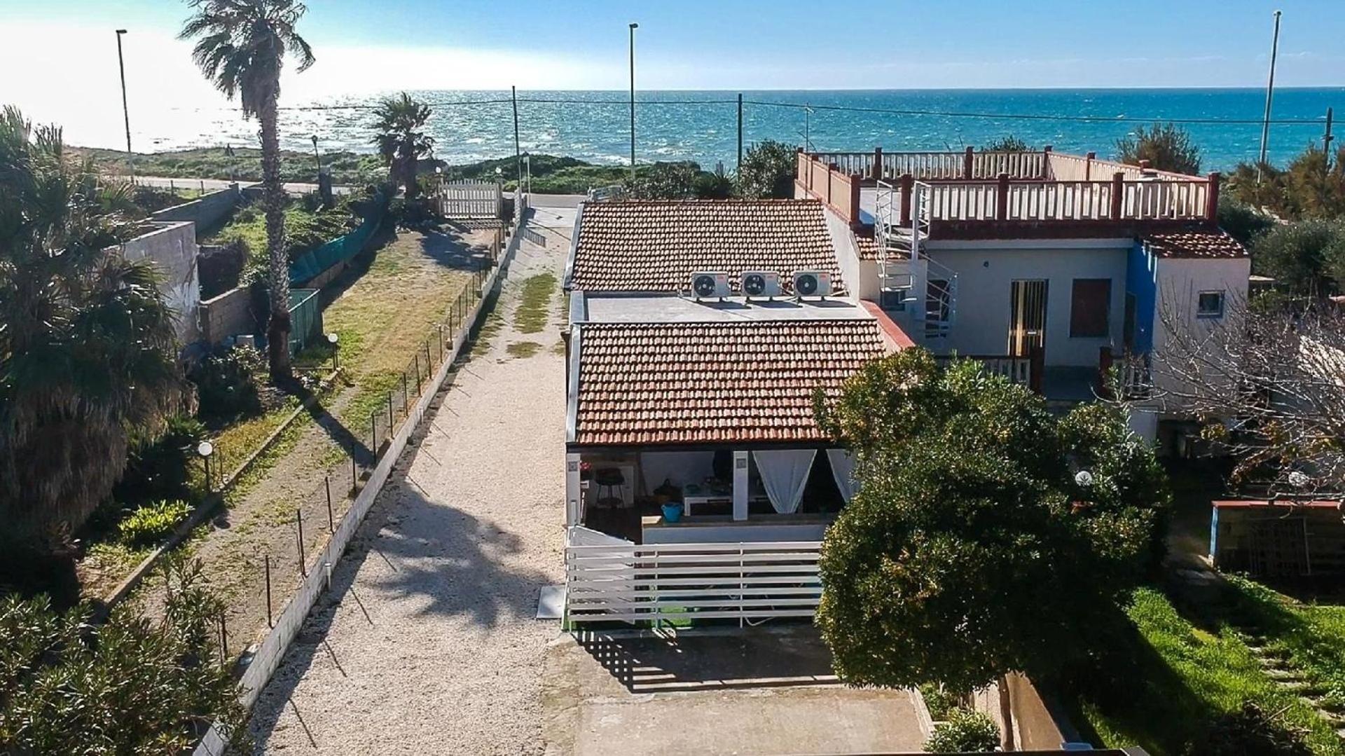 Edoné, Wohnung mit Blick auf einen Sandstrand